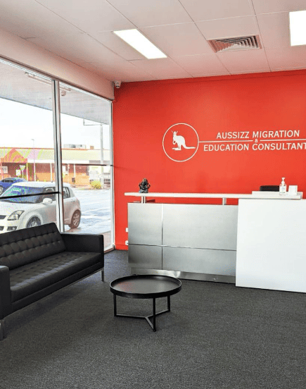 Aussizz Group Pakenham advisor working at desk